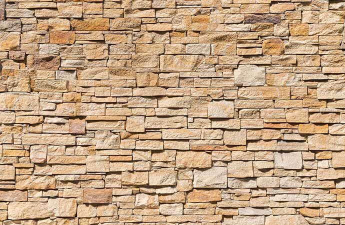 Fases de um projeto de renovação de muro em meulière em Portugal